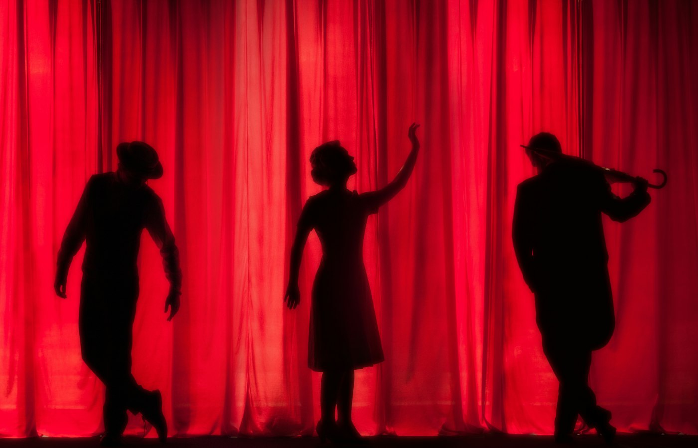 Stage lights in a darkened theatre